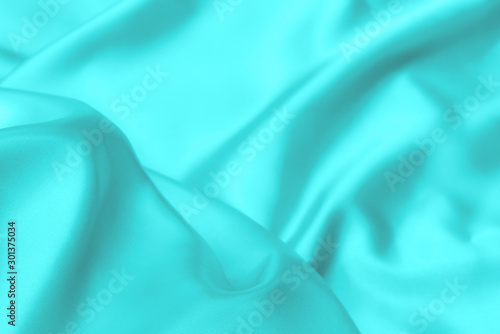 Cyan-Teal satin fabric texture soft background