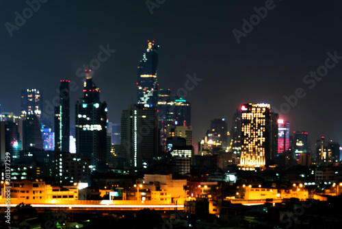 Night bokeh light of cityscape in Thailand