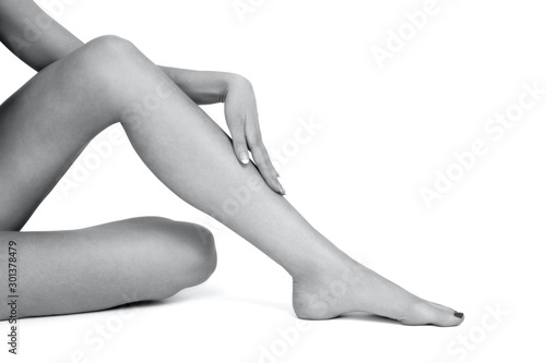 Beautiful female legs and hands, Skin care concept. Laser hair removal