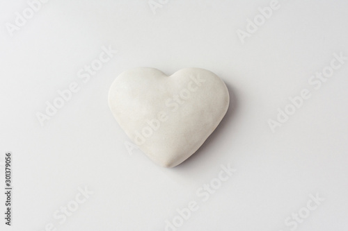 Gingerbread glazed in the form of hearts on a white background.