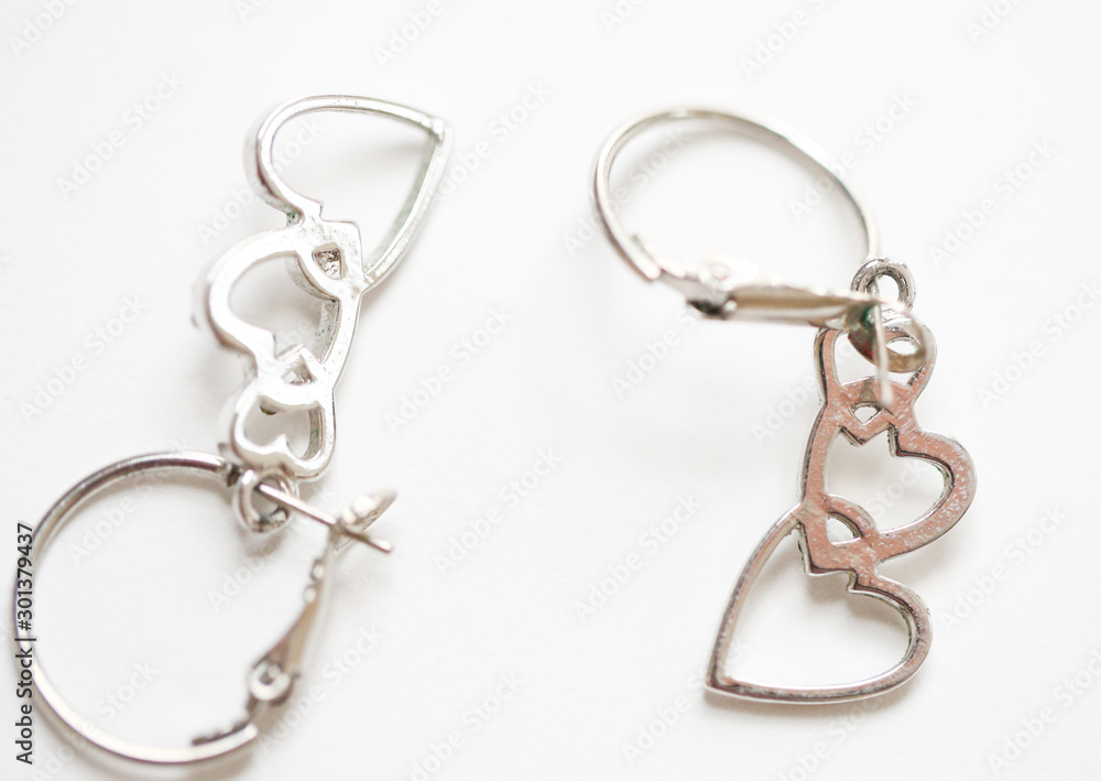 Three hearts in a line earrings. set of fashion earrings and decorations - Image Three hearts in a line earrings. set of fashion earrings and decorations - Image