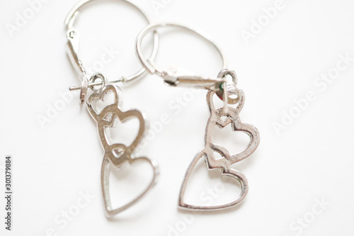 Three hearts in a line earrings. set of fashion earrings and decorations - Image