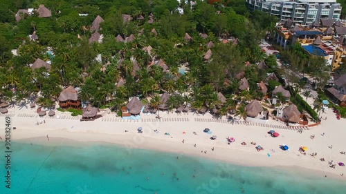 Flying over the coastline along the beach of Playa del Carmen in Mexico photo