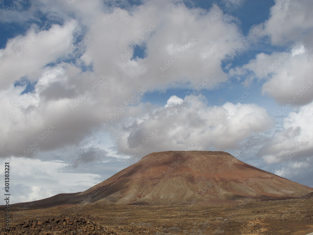 Tindaya, The magical and sacred mountain on the Fuerteventura Island of Canary island, Fuerteventura, Corralejo Natural Park, Spain, Tindaya, The magical and sacred mountain on the Fuerteventura Island of Canary island, Fuerteventura, Corralejo Natural Park, Spain,