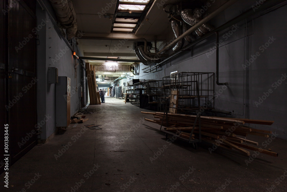  Long dark corridor in an old industrial building