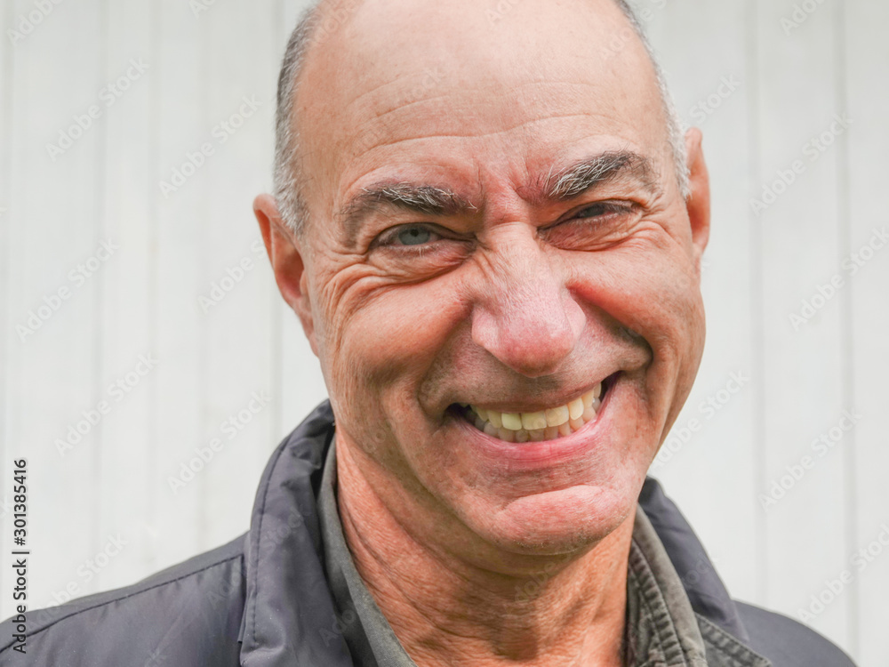 A happy mature man with smile on his face A happy mature man with smile on his face