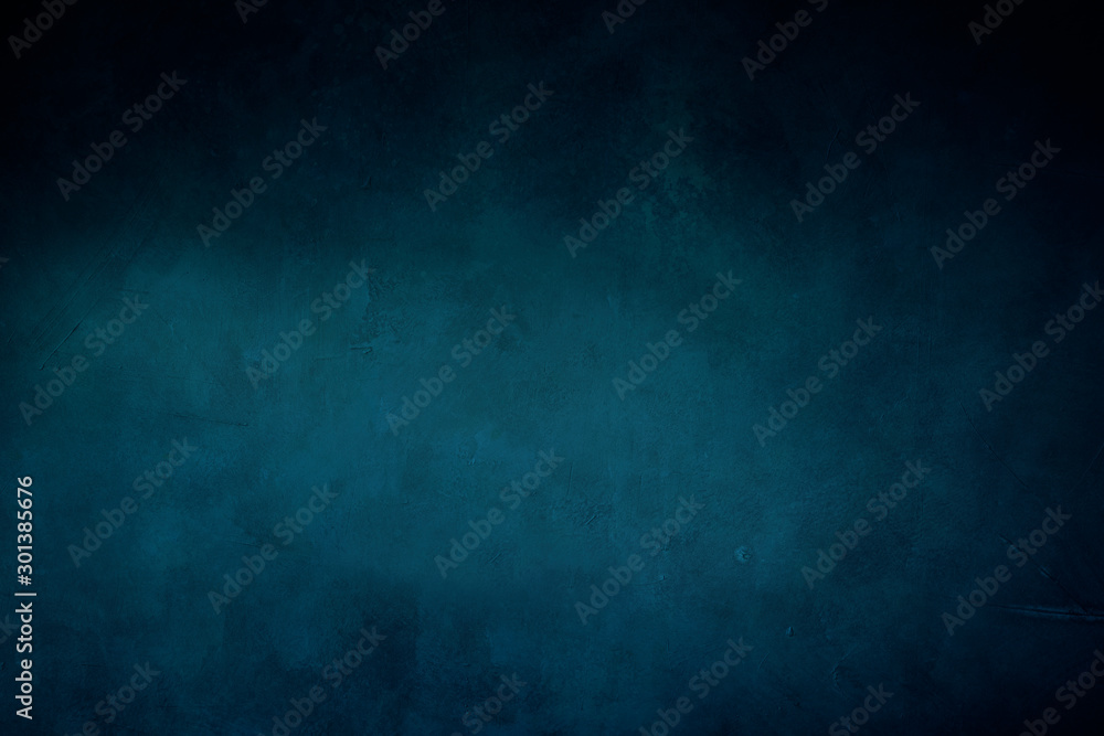 dark blue grungy background or texture with pastel hues