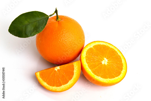 oranges with leaves isolated on white background