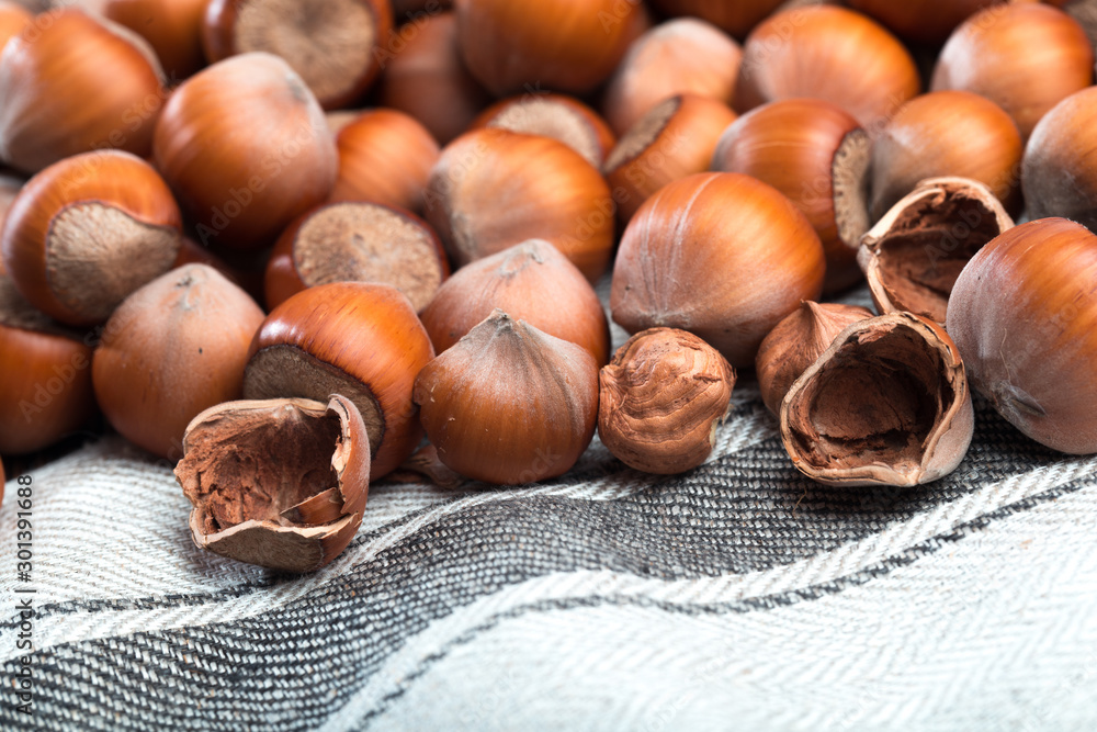 Obraz premium close up of hazelnuts on table .