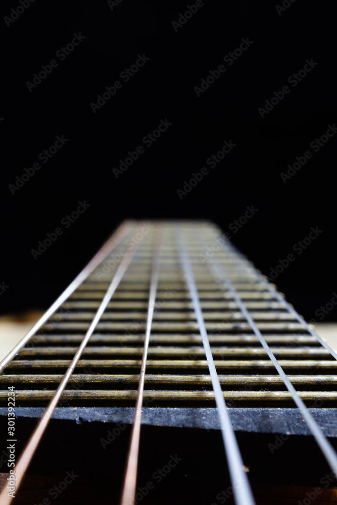 acoustic guitar strings on black background acoustic guitar strings on black background