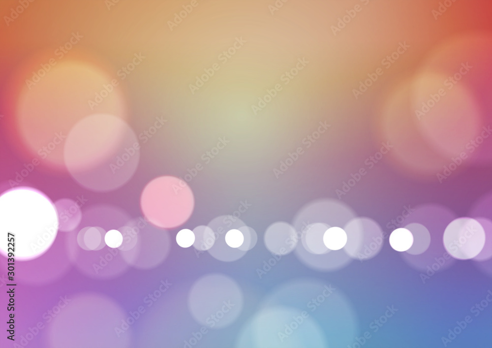 Abstract bokeh light on blurred colors background