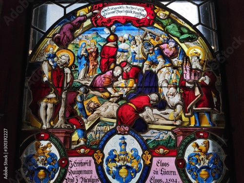 Stained glass religious scene