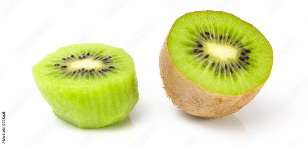 Fototapeta premium Green kiwi cut in half half on a white background