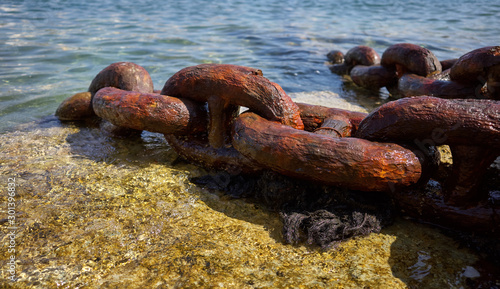 Closeup  Rusty Shipping Anchor Chain on the seashore of Manoel Island Malta 
