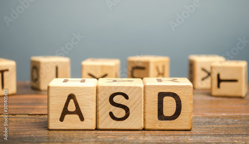 Wooden blocks with the word ASD - Autism Spectrum Disorder. Neurological and ...