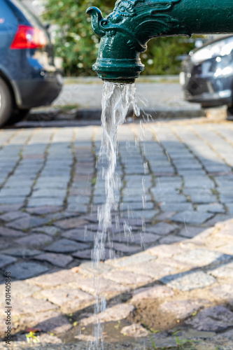 public water fountain in the streets of Berlin
