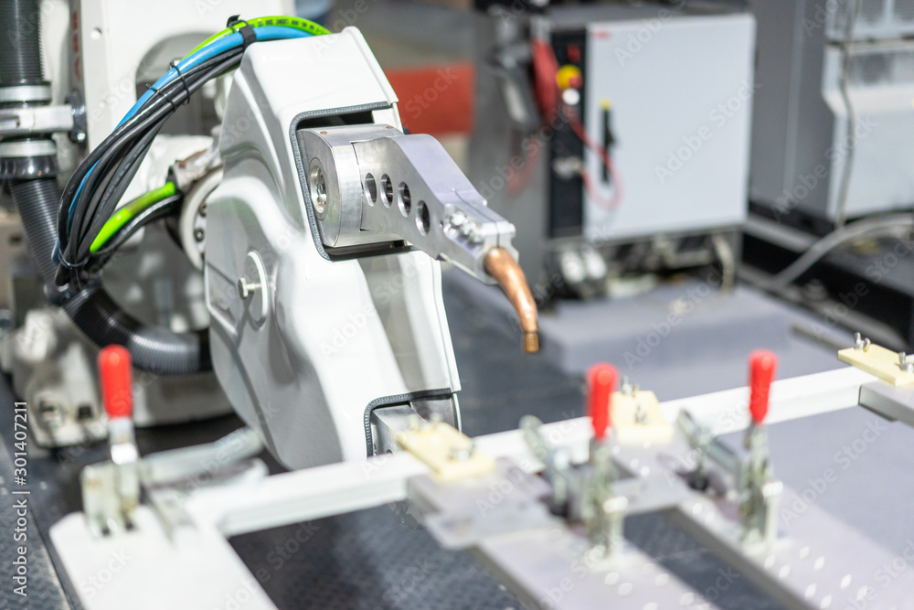 robot arm in factory robot arm in factory
