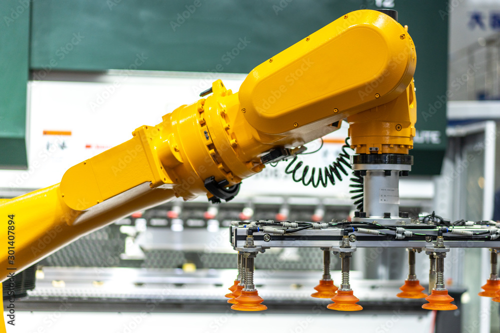 robot arm in factory robot arm in factory
