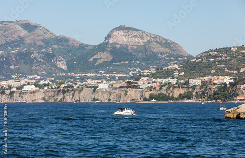 Fototapeta Naklejka Na Ścianę i Meble -  Town of Sorrento as seen from the water, Campania, Italy