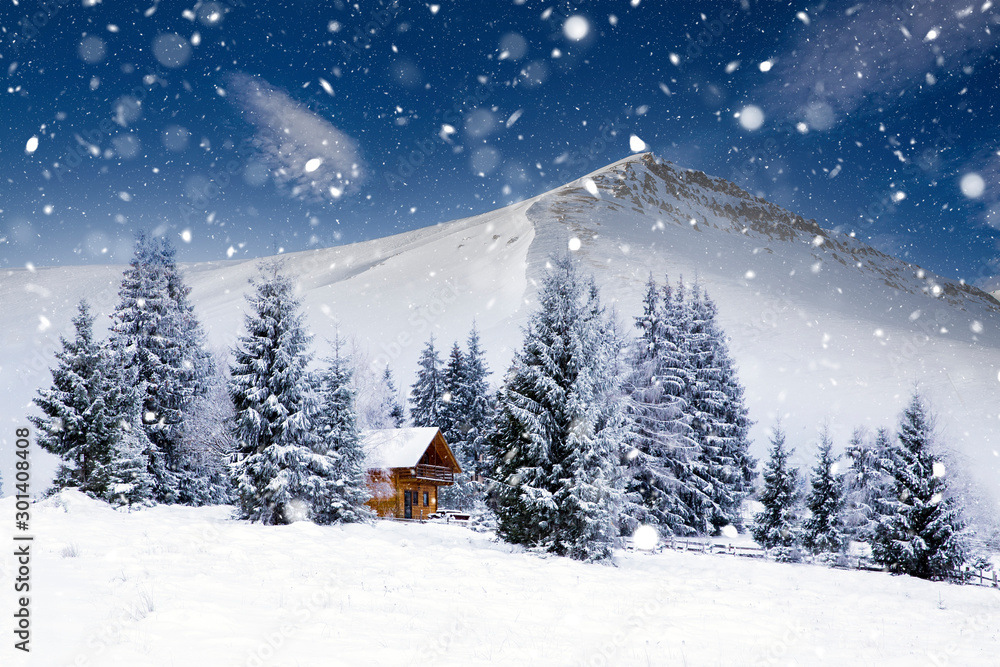 Wooden cottage in a fairy-tale winter landscape.