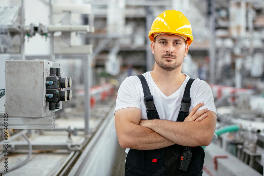 Portrait of factory worker in uniform Portrait of factory worker in uniform