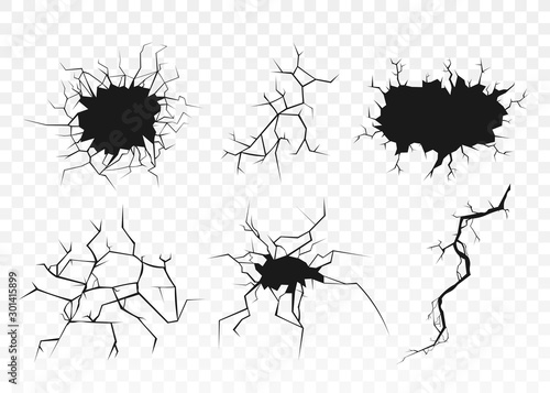 Black surface crack set with holes and broken ground texture