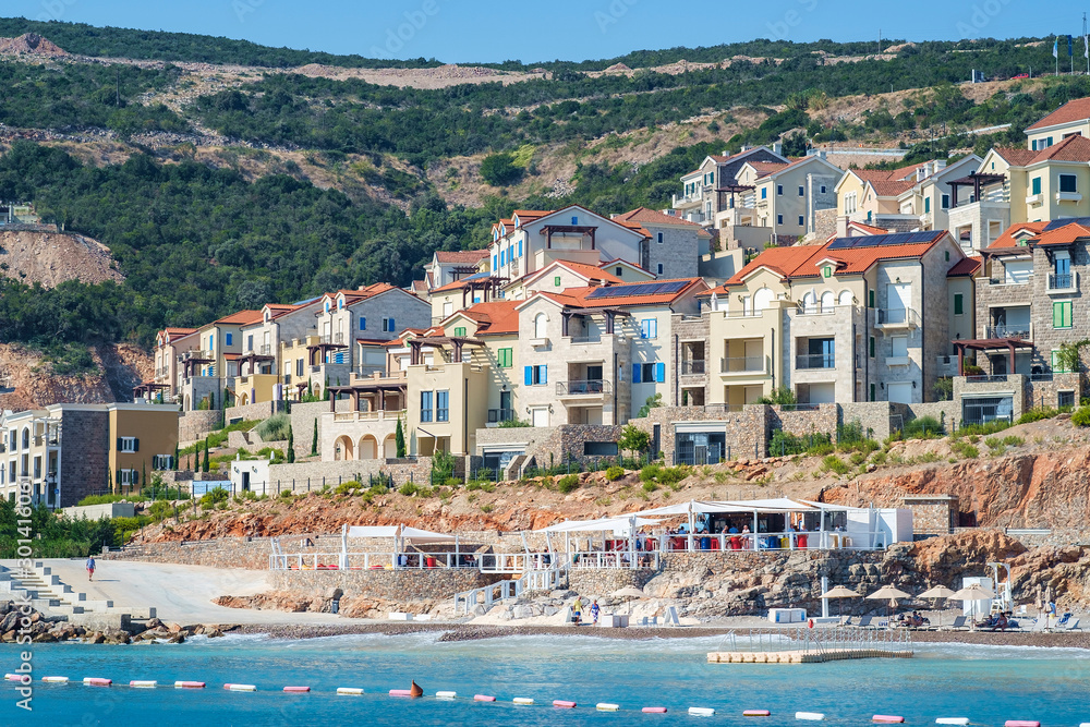 Shore and beach of a seaside town, view from the sea