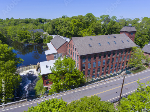 Sandford Mill on Charles River aerial view in Medway historic town center in summer, Medway, Boston Metro West area, Massachusetts, USA. photo