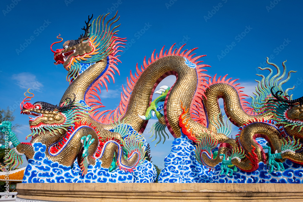 Obraz premium Chinese Happy New Year. Chinese dragon decoration on festive blue sky background.