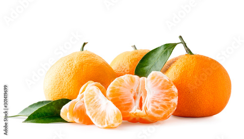 Ripe tangerines with leaves and peeled on a white, isolated.