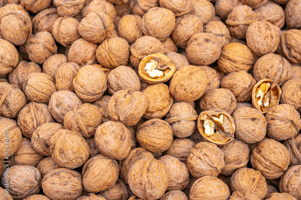 closeup of walnuts on display at the market closeup of walnuts on display at the market