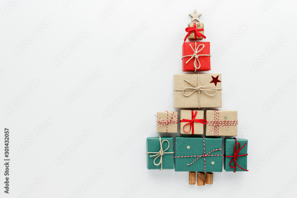 Fototapeta premium Christmas composition. Gift tree top view background with copy space for your text. Flat lay.
