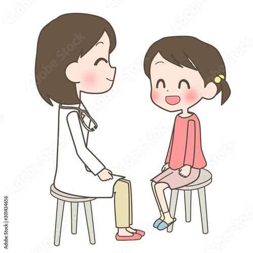 医師と話す女の子