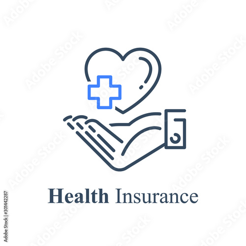 Human hand holding heart and cross, health care concept, medical help, non profit charity fund