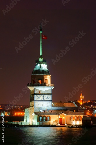 Maiden's Tower at night. Maiden's Tower and Far Galata Tower.