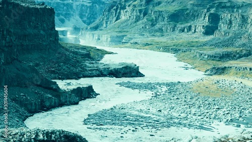 The Skjalfandafljot River, north of Iceland. Skalfandafljot is 178 km long, the fourth longest river of Iceland. Typical Icelandic scene. Summer day. Selective focus. photo