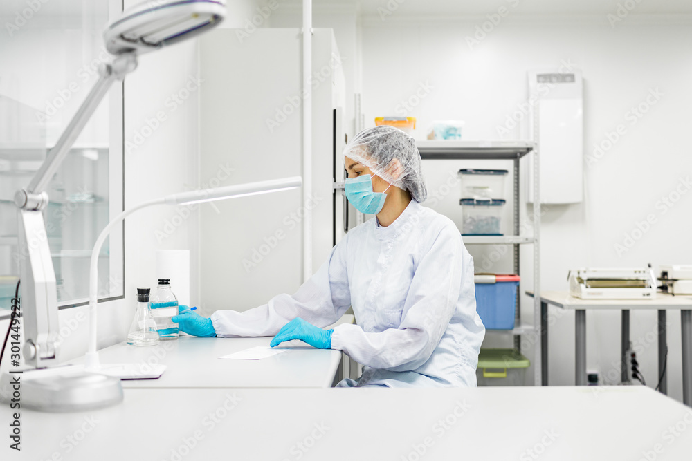 Naklejka premium Laboratory for the production of biomaterials. People do research.