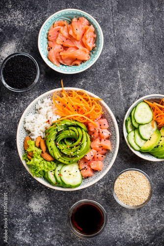 Hawaiian poke bowl with salmon, rice and vegetable