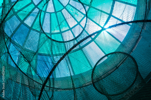 Modern building ceiling with net, abstract photography.