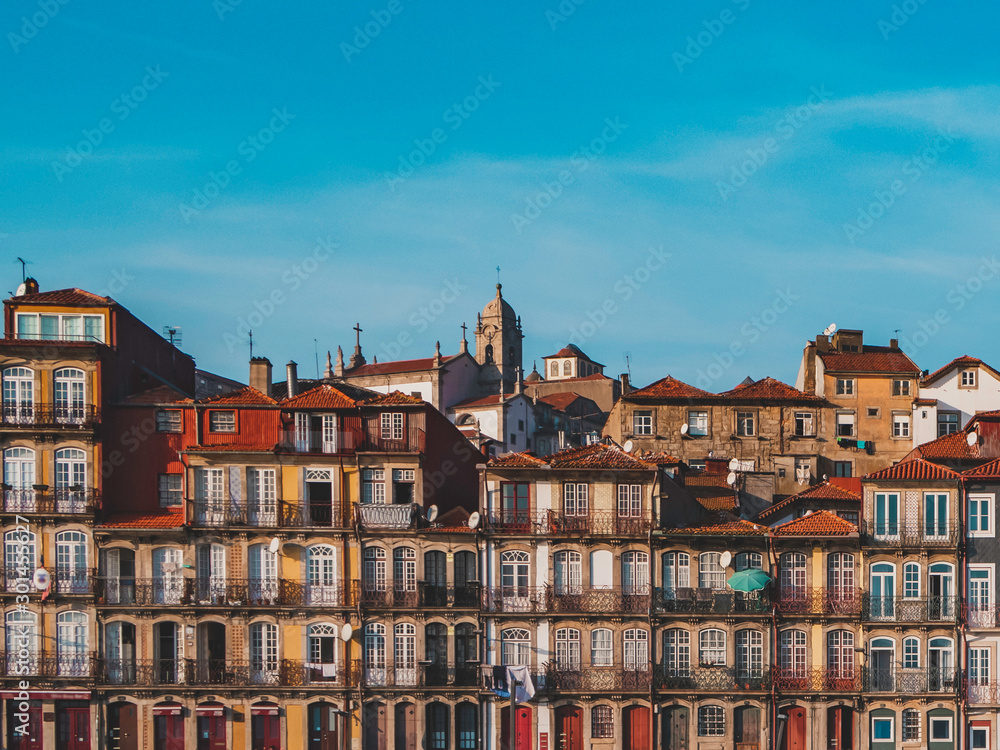 Fototapeta premium Colorful houses of Ribeira, in front of the Douro river in Porto, Portugal