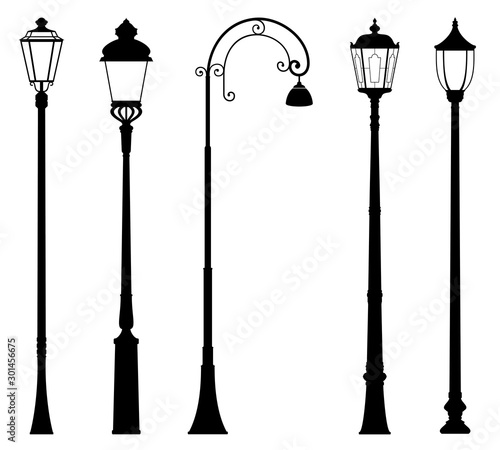 Vector set of decorative street lantern silhouettes in retro style, in black color, isolated, on white background. 