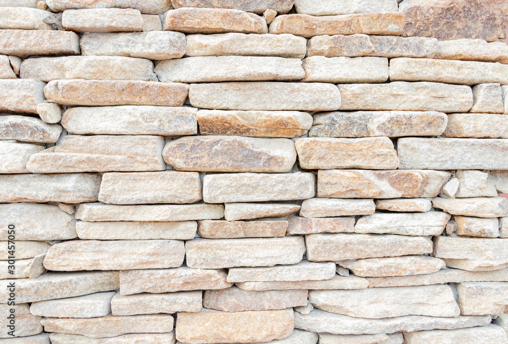 Obraz premium Bricked wall pattern, buildings around you, background.