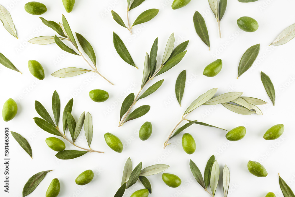 Pattern with green olive fruits with leaves on white background. Top view. - obrazy, fototapety, plakaty 