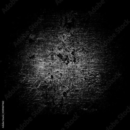 Abstract gray round dust stain on black background. Grunge texture with scratches, spots and dots