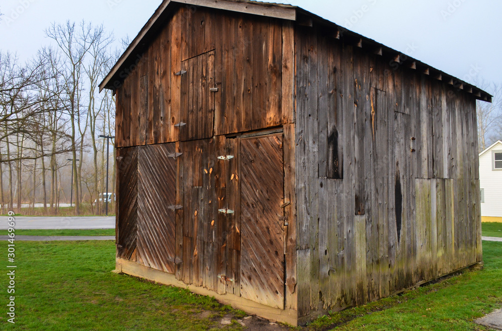 USA, Ohio -  April 26, 2018: Wooden Background, Old Rotten Board Shed, 18th Century Building, Ohio USA