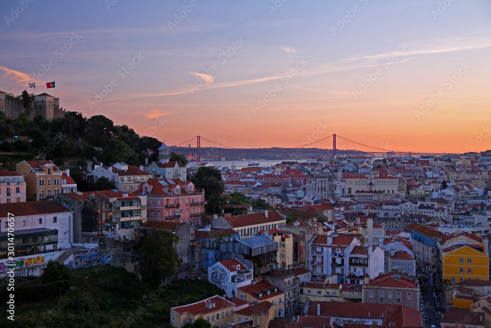 Panorama of Lisbon with the 25th of April bridge at dusk