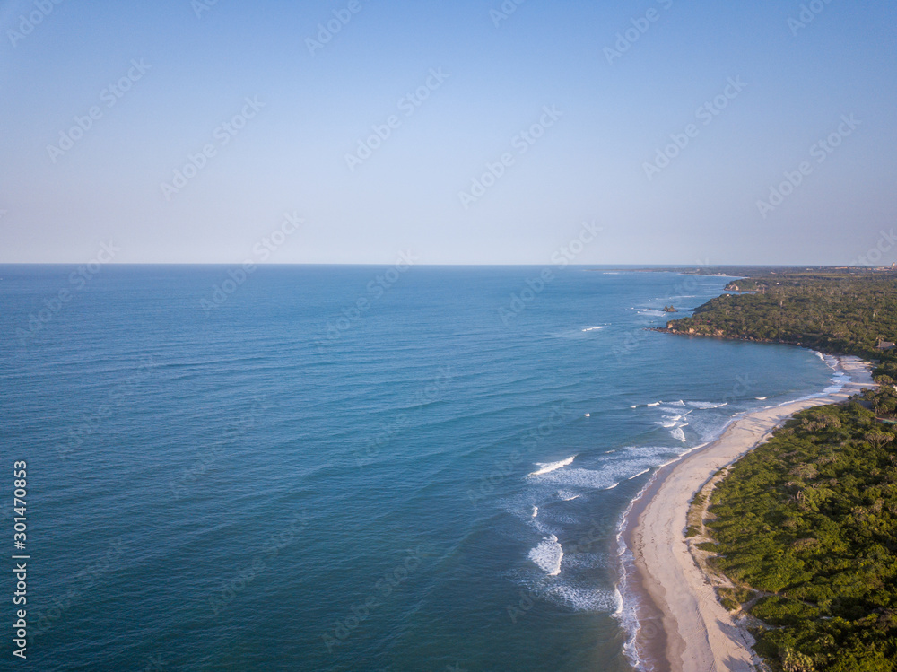 Drone picture of waves hitting the beach. Drone picture of waves hitting the beach.