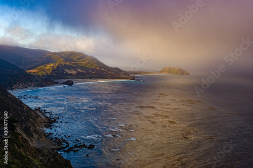Dramatic photo of clouds over Point Sur at sunrise