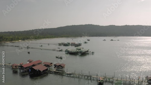 Pearl mining and living houses in the water in Vientam photo