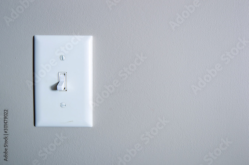 White switch on grey wall 4583